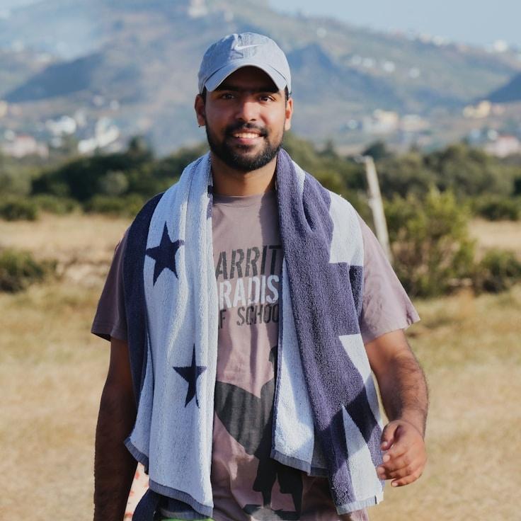 Avery Chen, Lead Design Curator at Orchid Grove Parcel, reviewing corporate floral arrangements